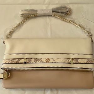 Women’s Ann Taylor “Belled Foldover Bag”.